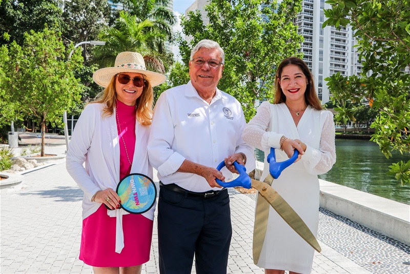 Commissioner Manolo Reyes and Commissioner Sabina Covo with resident at the New Baywalk Ribbon Cutting Ceremony Behind First Presbyterian Church on Brickell