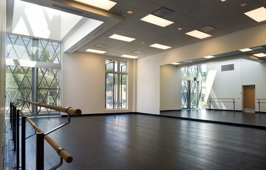 dance studio with wood floors and mirrors