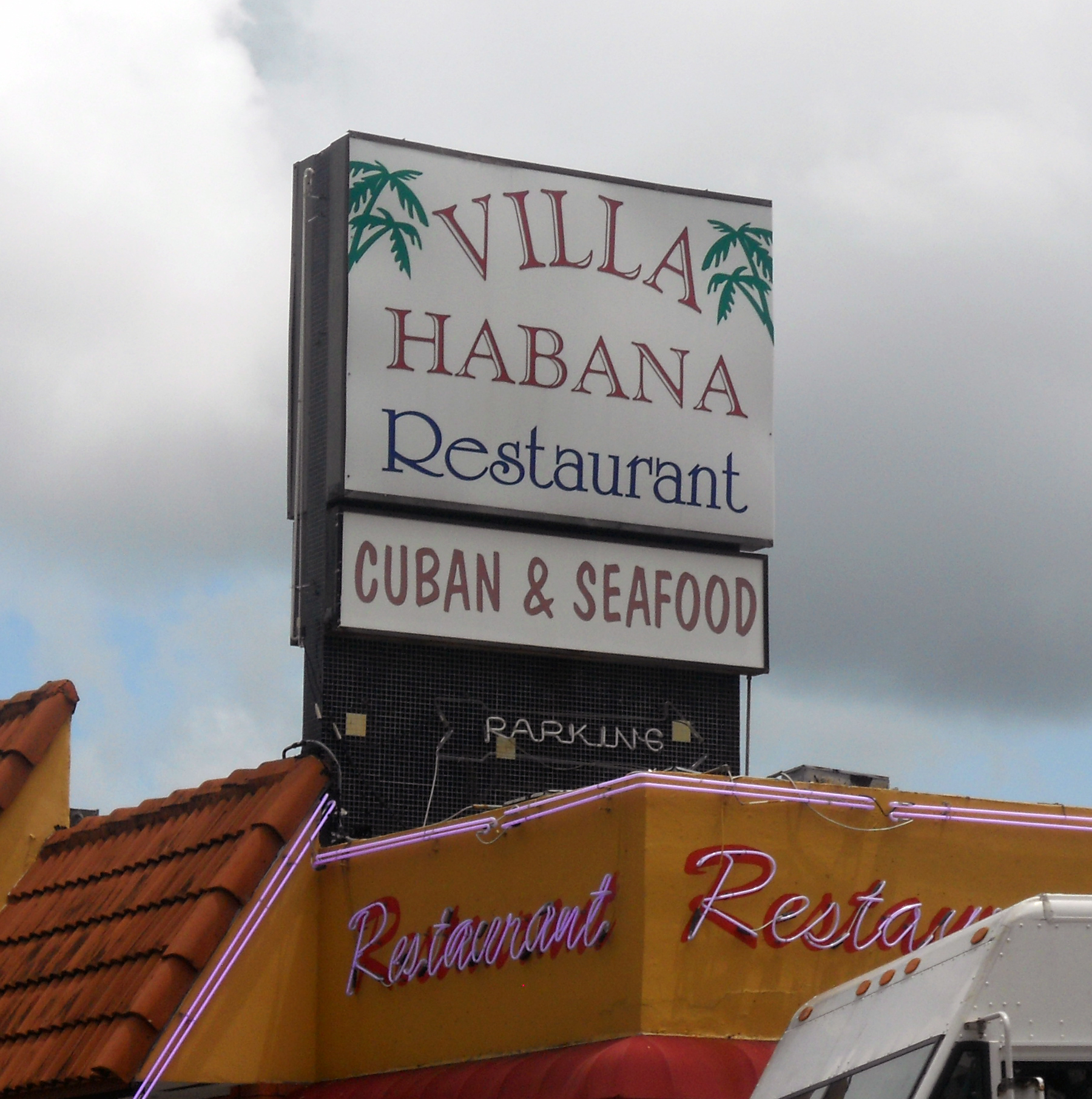 Sign above a restaurant roof